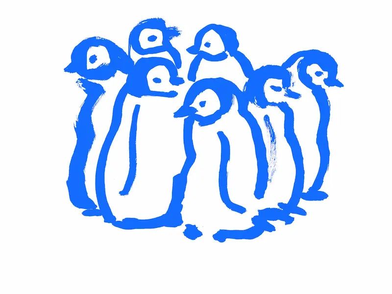 penguines standing close together in a group